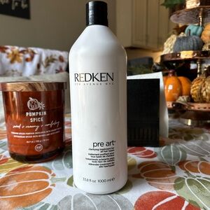 Redken pre art clarifying g treatment.